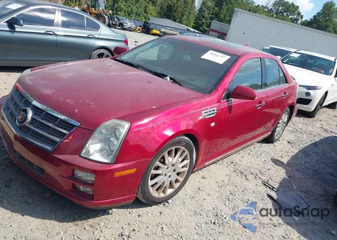 2010 Cadillac Sts Premium Package z USA, uszkodzony, nr VIN 1G6DU6EVXA0106117
